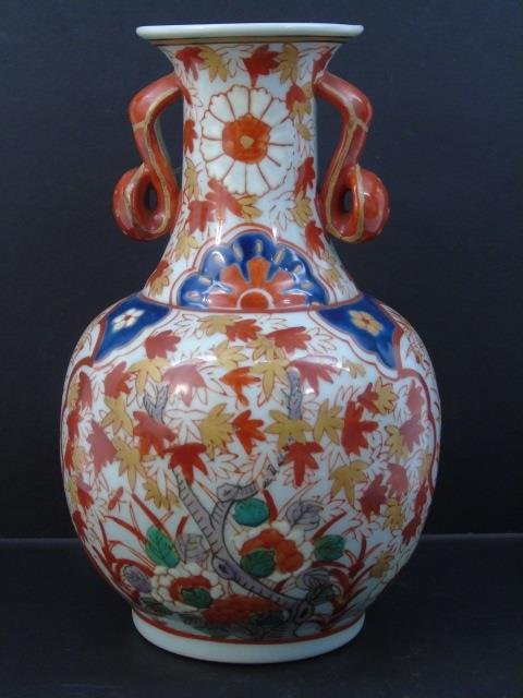 Antique Japanese Signed Imari Porcelain Vase: Antique Japanese Signed Imari Porcelain Vase. Measures 9 inches in height.