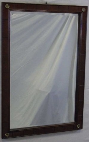 Mahogany Mirror with Brass Rosettes: Mahogany mirror with brass rosettes in corners. Beveled edged mirror. 32" H x 22 3/4" W.