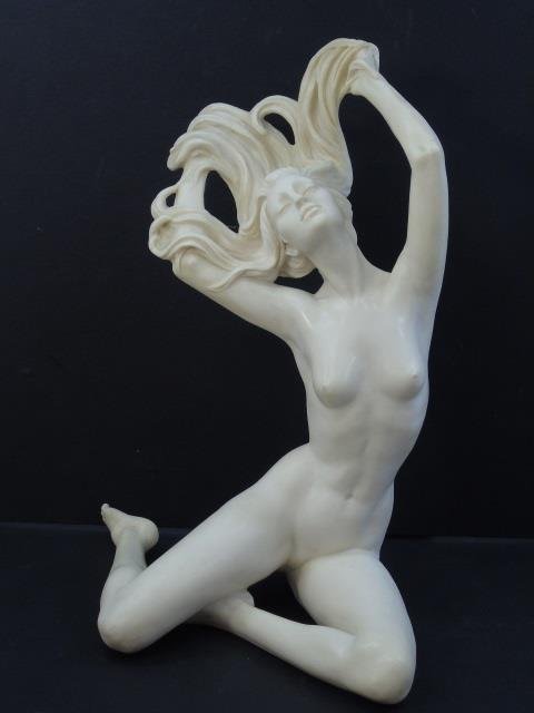 Nude Statue of a Reclining Female by Santini: Nude Statue of a Reclining Female by Santini. Measures 10 inches in height.