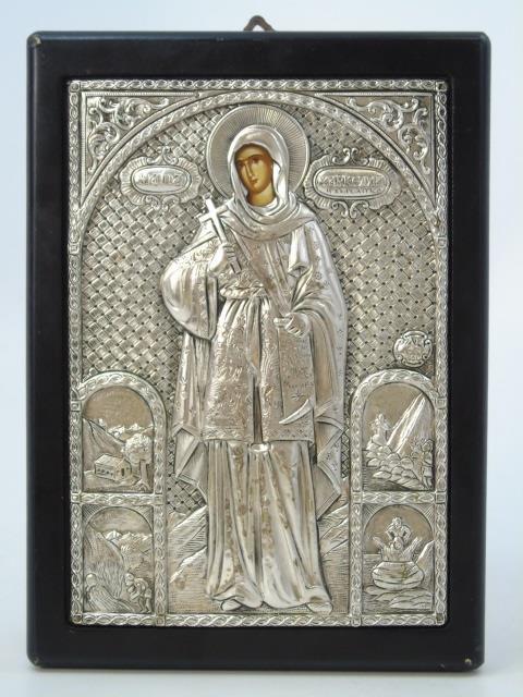 Contemporary Greek 950 Silver Painted Icon: Contemporary Greek 950 Silver Painted Icon. Hallmarked 950, hand painted oil paint face on board, inscription, black wood frame. Measures 8.75 x 6.25 inches.