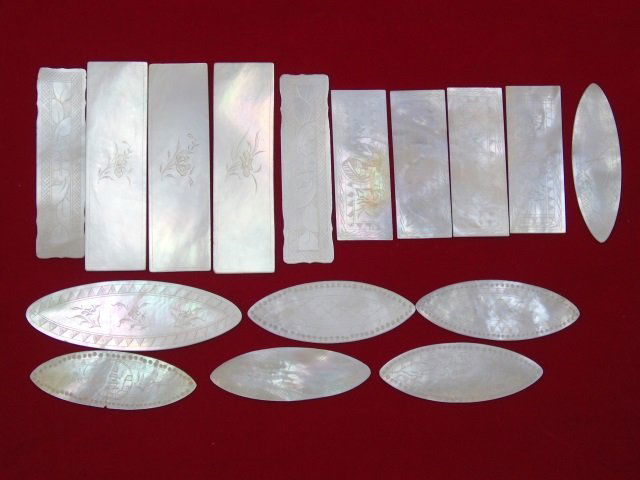 Antique Chinese Carved Mother of Pearl Game Pieces: Antique Chinese Carved Mother of Pearl Game Pieces. Various shapes. Each carved on both sides with patterns, geometric designs, flowers, pagodas and vines.