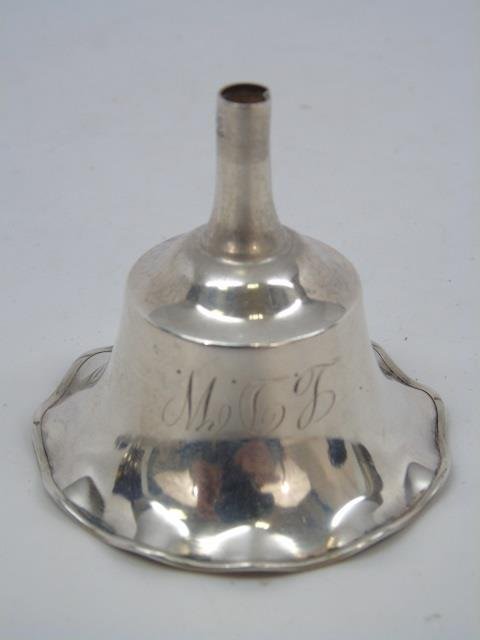 Antique Sterling Silver Perfume Funnel: Antique sterling silver funnel. Interior is gold vermeil. Tulip shaped. Marked "Sterling, 107, W". 2" diameter x 2".