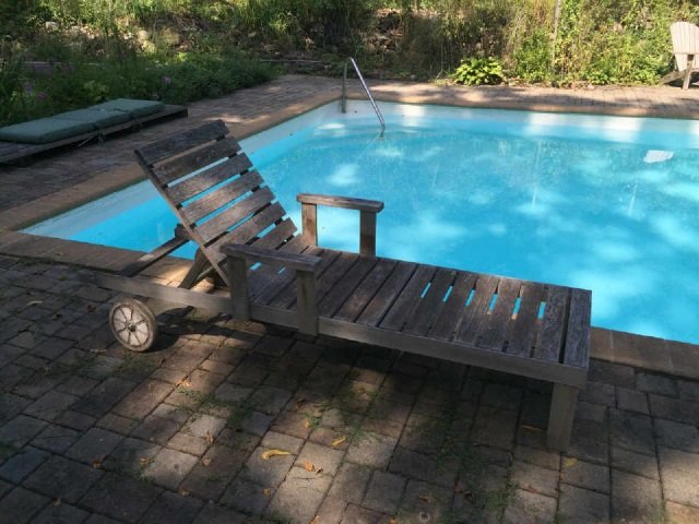 Contemporary Teak Pool / Patio Lounge Chair: Contemporary Teak Pool / Patio Lounge Chair. Adjustable back. Measures 36 x 78 x 28 inches as shown.