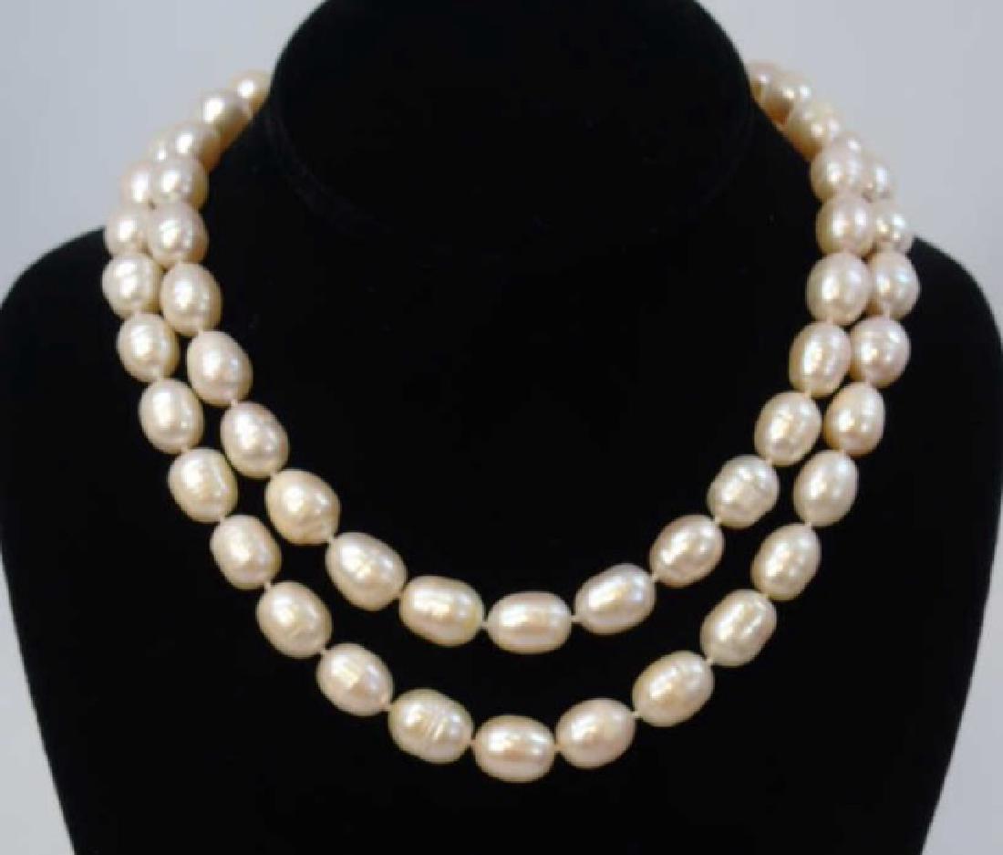 Pair Large Ivory Tone Baroque Pearl Necklaces (1 of 4)
