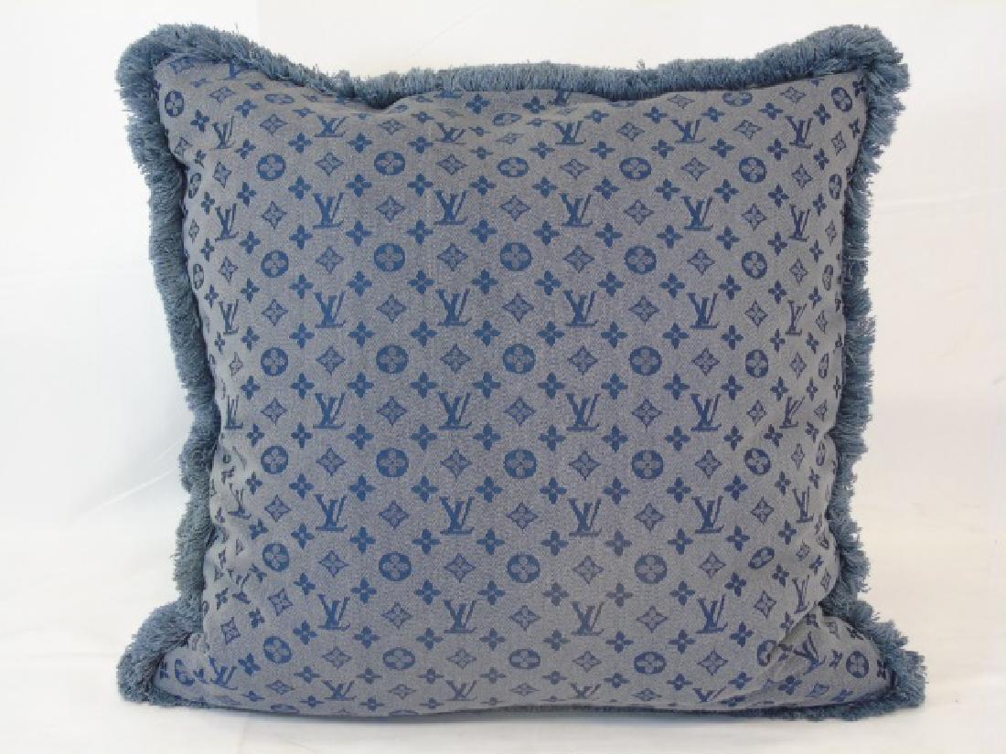 Vintage Louis Vuitton Fabric Blue Throw Pillow: Vintage Louis Vuitton Fabric Blue Throw Pillow. With fringe. Measures 18 x 18 inches.