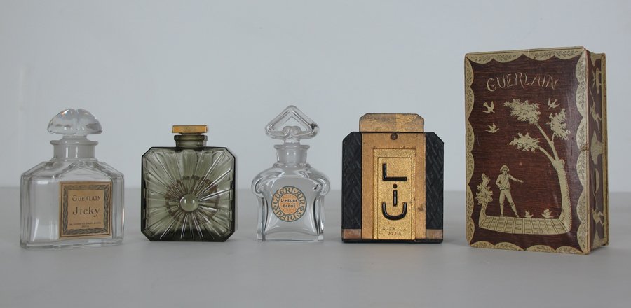 Guerlain Perfume Bottles & Boxes: 3 Guerlain Perfume Bottles & 2 Boxes; Guerlain Jicky Baccarat, Guerlain L'Heure Bleue & Guerlain Vol De Nuit; 2 Guerlain Boxes. Various Sizes