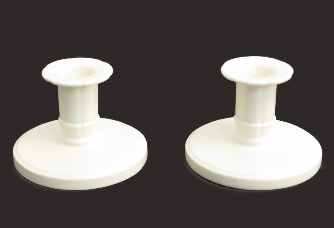 Pair of candlesticks by Keith Murray for Wedgwood: Pair of candlesticks by Keith Murray for Wedgwood Height: 3 Width: 4 Depth: 4