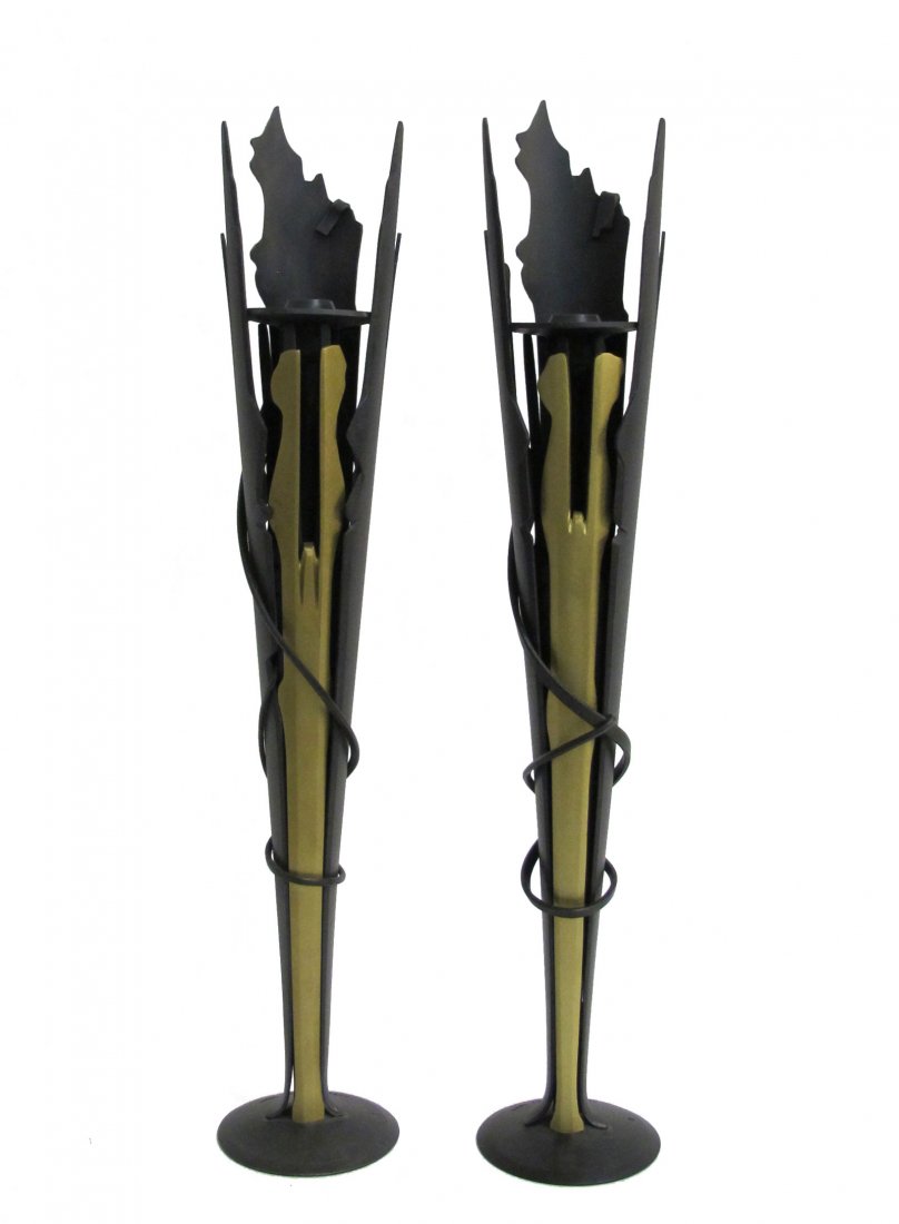 Pair of Large signed Albert Paley Candlesticks: Rare pair Albert Paley Candlesticks crafted from matte black and brass metal. Each candlestick is signed and dated on the base. HEIGHT: 20.5 in. (52 cm) WIDTH: 3.5 in. (9 cm) DEPTH: 3.5 in. (9 cm)