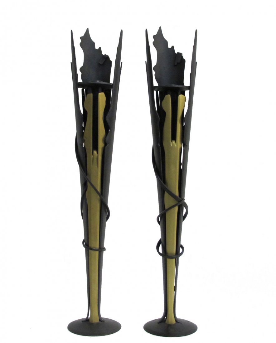 Pair of Large signed Albert Paley Candlesticks: Rare pair Albert Paley Candlesticks crafted from matte black and brass metal. Each candlestick is signed and dated on the base. HEIGHT: 20.5 in. (52 cm) WIDTH: 3.5 in. (9 cm) DEPTH: 3.5 in. (9 cm)