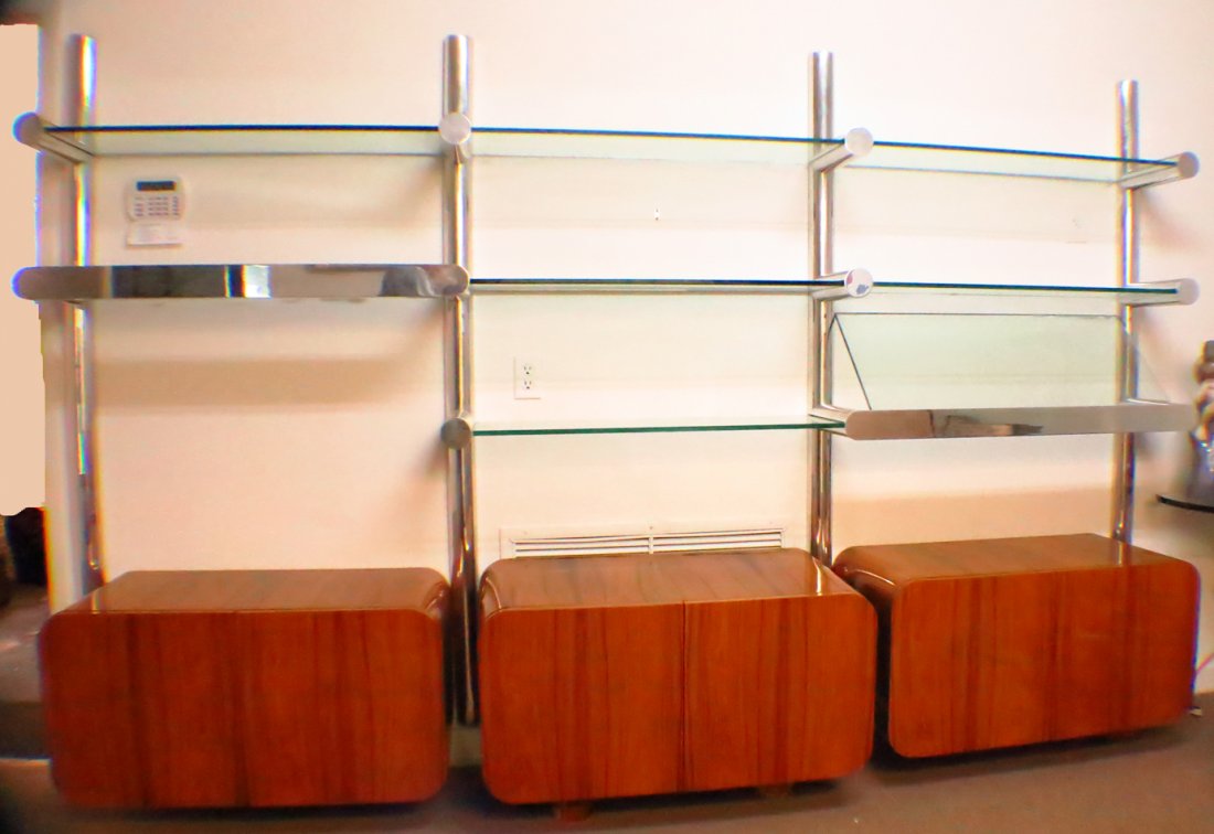 Pace Wall Unit: Three section wall unit floating cabinets on bottow with built in illumination 72x121x18.25