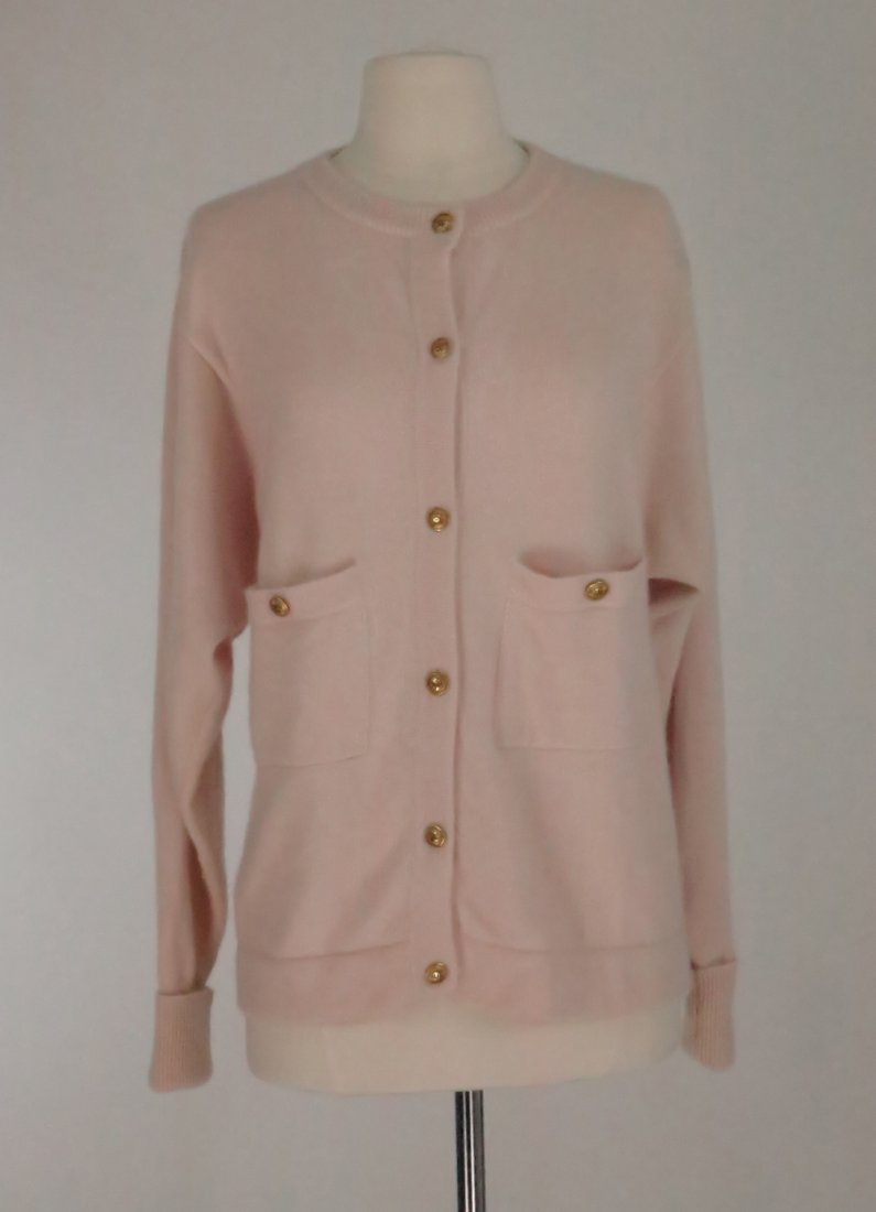 Chanel pale pink cashmere sweater: Pale pink cashmere sweater with four button pockets approx small-medium