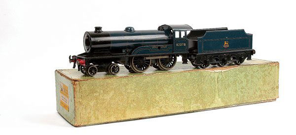 Bassett-Lowke O Gauge BR 4-4-0 Prince Charles: Bassett-Lowke 4-4-0 Loco and Tender BR blue "Prince Charles" No.62078, 3-rail electric. Excellent contained in a Bassett-Lowke clockwork Prince Charles box, box Fair.