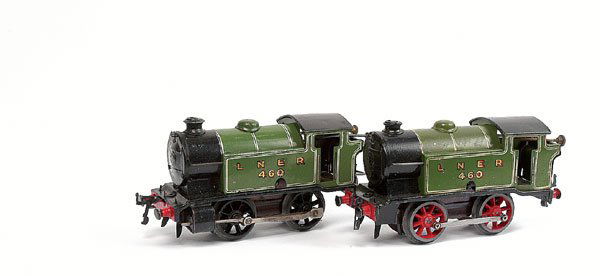 Hornby O Gauge 2 x 0-4-0 LNER Tank Locos: Hornby O Gauge 0-4-0 Tank Loco LNER green No.460, clockwork. Version without cylinders but with rods. The lot also includes a post-war 101 Tank Loco 0-4-0 LNER green No.460, clockwork. Good. (2)