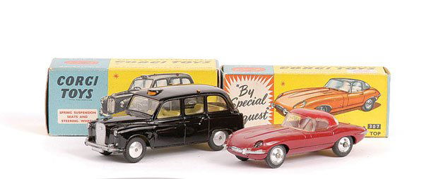 Corgi - No.307 Jaguar E-Type: Corgi - No.307 Jaguar E-Type - plum red including hood, brown interior, spun hubs - Near Mint in Good Plus to Excellent blue and yellow carded box and No.418 Austin Taxi - black, lemon interior, grey