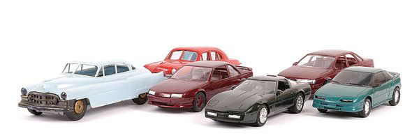 A Group of 1/24th Scale Plastic Cars: AMT, SMP, Yohann and similar 1/24th scale plastic Cars. AMT (ERTL) comprise Chevrolet Camaro, Beretta GT, 1989 Taurus, 84 Corvette, Geo Storm, Corvette Convertible, Corvette ZR1 and Beretta GTZ - Near