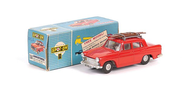 Spot-On No.184 Austin A60 Cambridge: Spot-On No.184 Austin A60 Cambridge - red, pale grey interior, chrome hubs, luggage rack with brown skis and sticks - Excellent Plus (apart from very slight loss of chrome to rear bumper edges in Good