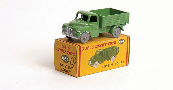 Dublo Dinky - No.064 Austin Dropside Lorry: Dublo Dinky - No.064 Austin Dropside Lorry - mid green, smooth grey plastic wheels - Near Mint to Mint in Excellent Plus box (the letters "BS" lightly stamped to one end flap which also has original p