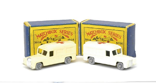 No.14 Daimler Ambulance - a pair: No.14 Daimler Ambulance - a pair - (1) cream body, black base, grey plastic wheels - Near Mint (apart from slight wear to red cross on roof) and (2) same as (1) but cream with metal wheels - Near Mint