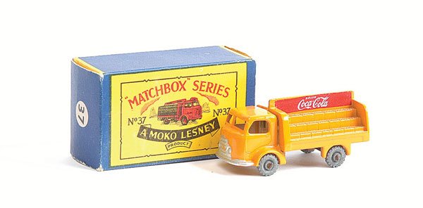 Matchbox No.37a Karrier Bantam Coca Cola Truck: Matchbox Regular Wheels - No.37a Karrier Bantam Coca Cola Delivery Truck - orange, even load, metal wheels - Excellent in Good Plus type B Moko box with model numbers in white circles to end flaps.