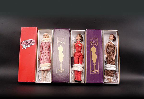 Effanbee Brenda Starr Reporter Vinyl Doll: Effanbee Brenda Starr Reporter Vinyl doll, 2003, Blond hair, wearing pink shot Silk dress, box; Tonner Tyler Wentworth Vinyl doll, Tag to wrist, auburn hair, wearing red leather trousers and halter to