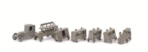 Simon & Rivollet group of cast metal Penny Toys: Simon & Rivollet, group of cast metal Penny Toys - dating from the early 1900s comprises early Vintage Car (lacks rear wheels), General Bus (lacks side of top deck) and a Train Set comprising Locomoti