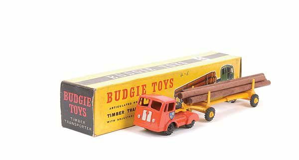 Budgie No.230 Seddon Artic Timber Transporter: Budgie No.230 Seddon Articulated Timber Transporter - burnt orange tractor unit with black metal wheels, yellow trailer with original timber load and yellow metal wheels - Good to Good Plus (trailer s