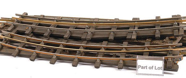Bassett-Lowke Wooden Sleepered Brass Track: Bassett-Lowke and similar O Gauge wooden sleepered brass 3rd rail track consisting of 18" straights x 14, 18" curves x 4, 24" crossover, 24" left hand points x 3, 18" right hand point x 14. Condition