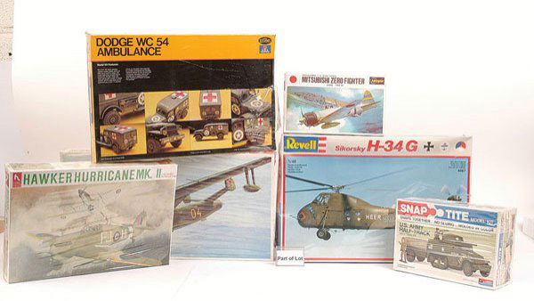 A Mixed Group of Military Related Plastic Kits: Military plastic kits Monogram, Revell, Hasegawa, Hobby Craft, Heller, plus others, models include Sikorsky Helicopter, Lockheed Neptune, US Army Half Track, Char Tank, Dodge Ambulance, US Personnel C
