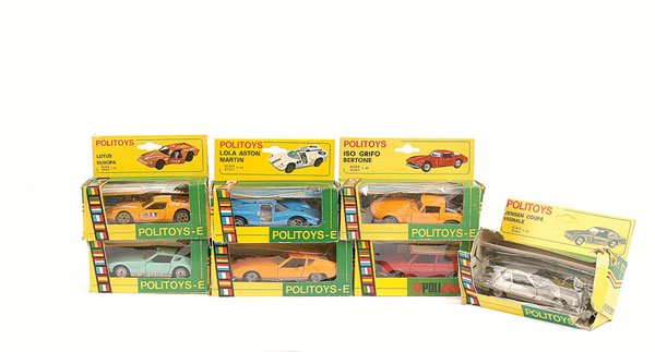 Politoys Export Series - A Group of Cars: Politoys group of Cars in green/yellow Export Series window boxes. (1) No.553 Iso Grifo - orange, black interior, cast hubs, (2) No.563 Lotus Europa - orange, bare metal interior, plastic wheels, (3)