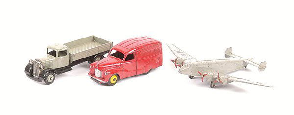 Dinky 25 Series Tipper Lorry and Others: Dinky 25 Series Tipper Lorry and other models. (1) 25 Series Tipper Lorry - scarce colour variation is grey, including ridged hubs, black type 4 chassis, (2) Austin Nestles Van and (3) Giant Highspeed