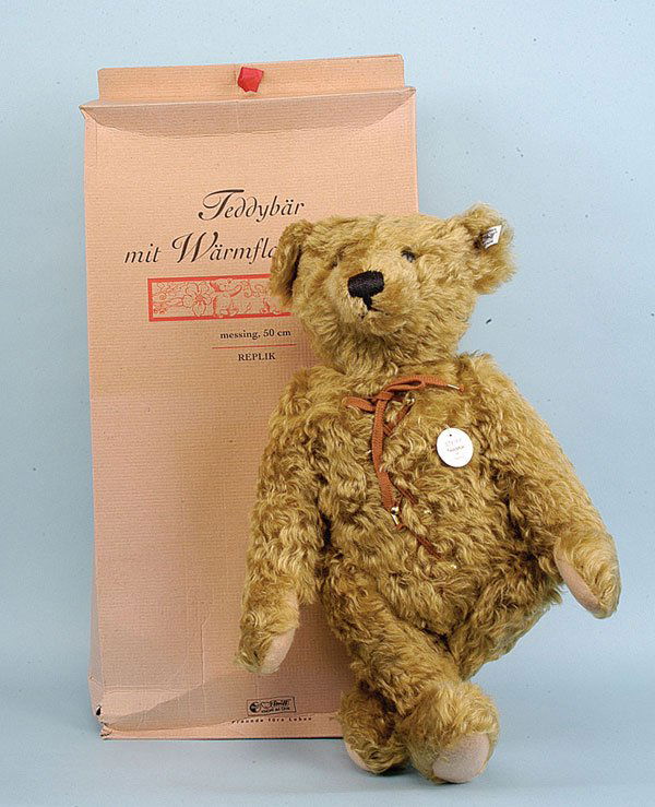 Steiff Teddy with Hot Water Bottle: Steiff Teddy Bear with hot water bottle 1907 replica, 2001, white tag 406621, LE 3000, brass mohair, chest tag, certificate, Mint in Good (crushed) box, 19.75"/50cm.