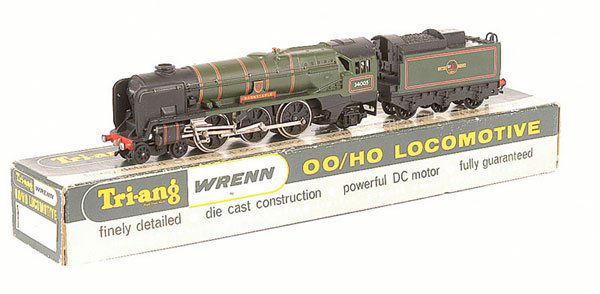Wrenn W2235 4-6-0 "Barnstaple" No.34005: Wrenn 2235 4-6-0 BR green West Country Class Loco No.34005 "Barnstaple" fitted with plastic pony truck and tender wheels, some damage to cab roof right side and some repainting to same area, otherwise