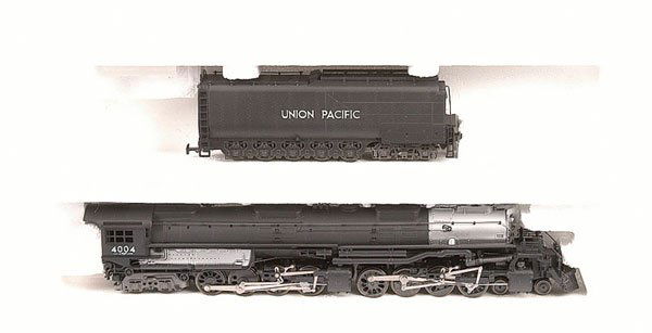 Rivarossi 1584 4-8-8-4 Union Pacific Steam Loco: HO Rivarossi 1584 4-8-8-4 Union Pacific black Steam Loco No.4004, this is later type with motor hidden in boiler, condition Excellent in Fair to Good later series box but with some sellotape repair to