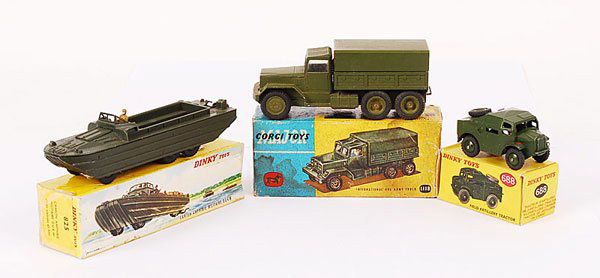 Dinky and Corgi Military Vehicles: Dinky and Corgi boxed Military vehicles. (1) No.688 Field Artillery Tractor, (2) No.825 DUKW Amphibious vehicle with driver, slight damage to rear propeller and lacks load, (3) Corgi No.1118 Internati
