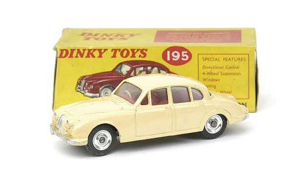Dinky Toys No.195 Jaguar 3.4 Saloon: Dinky Toys No.195 Jaguar 3.4 Saloon - cream, red interior, spun hubs - Excellent in Good Plus (slightly grubby) card box.