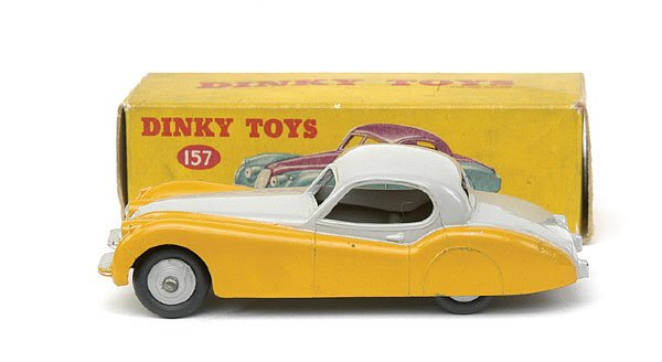 Dinky Toys No.157 Jaguar XK120 Coupe: Dinky Toys No.157 Jaguar XK120 Coupe - 2-tone, light grey upper and ridged hubs, deep yellow lower - Excellent Plus bright example overall contained in a Good (slightly grubby) card box with correct c