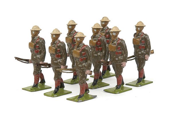 Britains Set258 British Inf in Steel Helmets: Britains - Set 258 - British Infantry in Steel Helmets & Gasmasks [1927 version], comprising: 8 x Infantrymen walking at the trail. Some minor paint chips otherwise -Very Good - un-boxed.