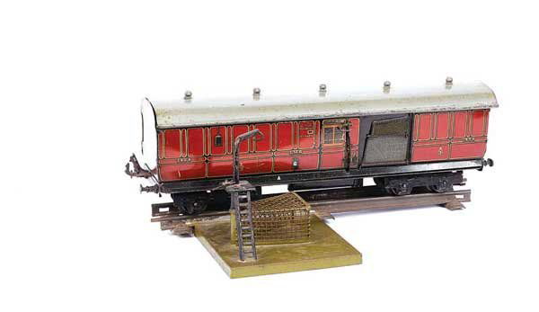Bassett-Lowke O Gauge LMS Post Office Coach: Bassett-Lowke O Gauge LMS Post Office Coach running number 1924. Sides are generally Good Plus to Excellent, comes complete with the Bassett-Lowke Mail Bag Operating Unit with a section 2-rail track.