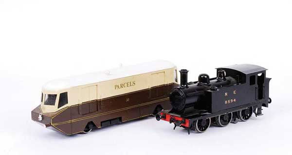 Kit/Scratchbuilt J67 0-6-0 Tank Loco No.8594: Kit/Scratchbuilt O Gauge J67 0-6-0 Tank Loco NE black No.8594, 2-rail Electric. Also included with this lot is a GWR 4-wheeled Railcar. Finished in GWR brown and cream with parcels and GWR lettering t