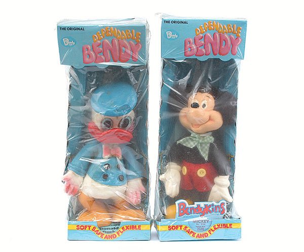 Bendy Toys Donald Duck and Mickey Mouse: Bendy Toys "Walt Disney's" Donald Duck and Mickey Mouse - both are generally Good Plus to Excellent in Good although grubby (originally factory sealed) window boxes. (2)