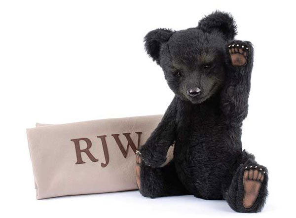 R. John Wright - Duncan Realistic Bear: R. John Wright - Duncan Realistic Bear, 2005, LE 188/300, black alpaca cub with airbrushed features, fully jointed, tag to bottom, certificate and registration card, beige felt "RJW" drawstring bag, M