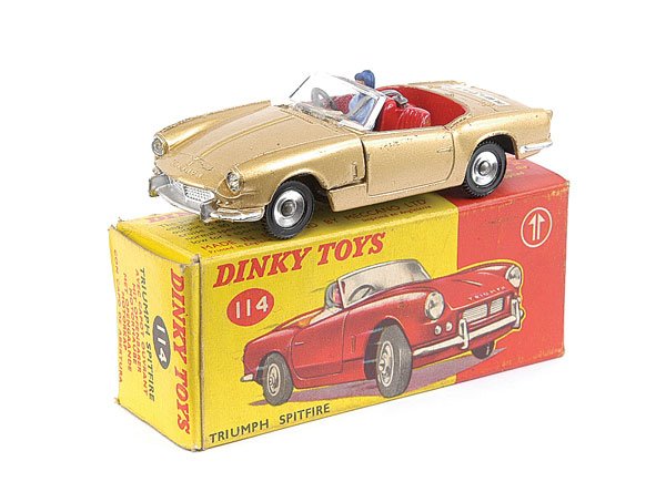 Dinky No.114 Triumph Spitfire "Tiger In My Tank": Dinky No.114 Triumph Spitfire - gold, "I've Got A Tiger In My Tank" to rear boot, lady driver with seat-belt - Excellent Plus in a Good card box.