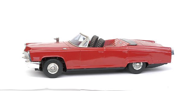 Cadillac Eldorado Convertible: A large scale tinplate model of the Cadillac Eldorado Convertible by unconfirmed Korean manufacturer - deep red, black base, plated parts, battery operation with steerable front wheels. 34cm - Excelle
