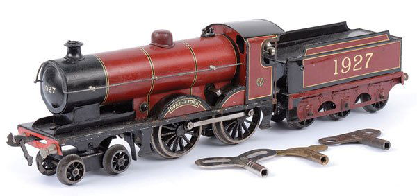 Bassett-Lowke 4-4-0 "DUKE OF YORK" No.1927: Bassett-Lowke 4-4-0 Loco and Tender LMS maroon "DUKE OF YORK" No.1927, Clockwork. Overall condition is Good Plus to Excellent.