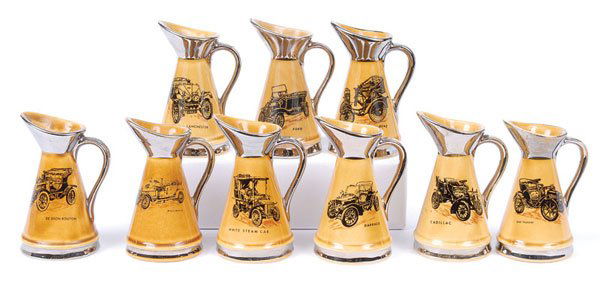 Moko/Wade Ceramic Pitchers - A Group of 9: Moko/Wade ceramic Pitchers a group of 9 all showing Veteran Cars as authenticated by the Veteran Car Club of Great Britain including - 1899 Benz, 1903 Lanchester, 1912 Ford Model T, 1903 Cadillac and