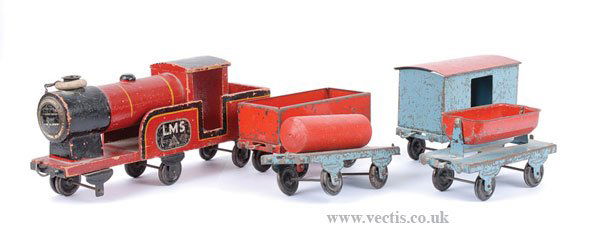 Lines Bros/Triang Pre-war Pullalong Train Set: Lines Bros (Triang) pre-war Pullalong Train set - lot comprises 6-wheeled wooden LMS Loco. Together with 4 x Pressed Steel Wagons including Tank Wagon (lacks one wheel), Side Tipper, Open Wagon and Go