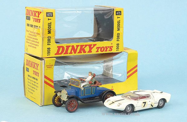 Dinky Cars in Yellow Export Style Window Boxes: Dinky Cars a pair in yellow Export style window boxes including - (1) No.475 1908 Ford Model T - blue, yellow panels, driver and female passenger, red spoked wheels - Near Mint to Mint in Excellent bo