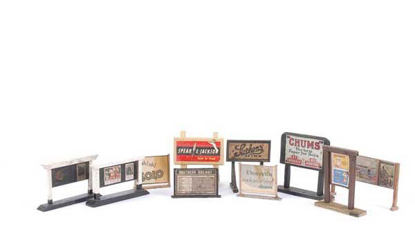 Bassett-Lowke & Other Railway Notice Boards: Bassett-Lowke and other wooden O Gauge Railway Notice Boards, some with enamel signs including Chums the Best Paper for Boys, Bassett-Lowke Advertising Notices for Harrogate, London Midland Scottish,