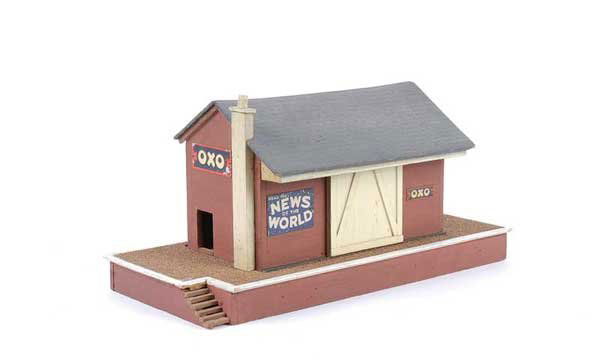 Bassett-Lowke O Gauge Goods Depot: Bassett-Lowke O Gauge Goods Depot. Has been refurbished with a number of enamel signs including Oxo, News of the World, Bovril, South for the Sunshine amongst others. Overall condition is Good.