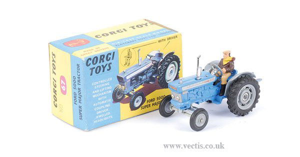 Corgi No.67 Ford 5000 Super Major Tractor: Corgi No.67 Ford 5000 Super Major Tractor - blue body, grey mudguards, grey plastic hubs, black tyres, driver - Near Mint to Mint with instructions in Near Mint blue and yellow card picture box. Also